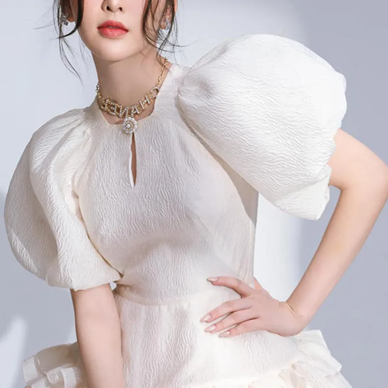 Chic Whirl: Puff Sleeve Jacquard Ruffled A-line Dress